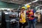 Portrait of manual woman and man worker is standing with confident and wearing safety helmet.