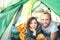 Portrait of Marriage couple meet morning in the green color tent. Smiling people concept photo