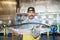 Portrait of mature fishmonger holding salmon fish