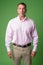 Portrait of mature macho businessman with pink shirt