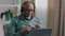 Portrait mature male in headset teacher online mentor business trainer talk in headset senior african american