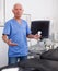 Portrait of mature male sonographer