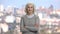 Portrait of mature woman on blurred city background.