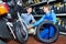 Portrait of mechanic and customer chatting about motorbike tires