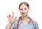 Portrait of medical doctor woman with stethoscope hand touching