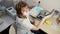 Portrait of a medical laboratory technician in respirator with tube in a hand