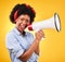 Portrait, megaphone or happy black woman with announcement or review on studio background. Broadcast, attention or voice