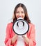 Portrait, megaphone or happy woman with announcement, speech or review on white background. Smile, attention or voice of