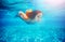 Portrait of mermaid girl dive underwater with fish