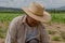 portrait of a Mexican farmer cultivating amaranth