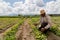 portrait of a Mexican farmer cultivating amaranth