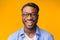 Portrait Of Millennial Afro Guy Smiling To Camera, Studio Shot