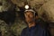 Portrait of a miner inside a mine