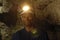 Portrait of a miner inside a mine