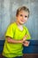 Portrait mischievous cute blond blue eyed boy making freckles face play laughing in happy mood. Funny photo, happiness