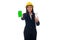 Portrait of mixed race asian/caucasian engineer woman with helmet holding blueprints and showing green screen mobile phone
