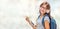 Portrait of modern happy teen school girl with bag backpack head