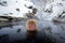 Portrait of monkey in water. Monkey Japanese macaque, Macaca fuscata, red face portrait in the cold water with fog, animal in the