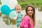 Portrait of mother with her son outdoors