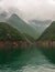 Portrait of mountains under misty cloudscape along Daning River, Wuchan, China