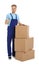 Portrait of moving service employee with cardboard boxes