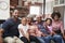 Portrait Of Multi Generation Family Relaxing On Sofa At Home Together