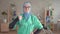 Portrait of muslim woman in hijab doctor shows thumb up