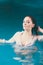 Portrait of mysterious seductive woman in water.