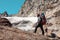 Portrait of Nepalese Mountain Guide staying on Rock and Glacier