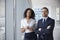 Portrait Of New Business Owners In Empty Office