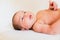 Portrait of newborn baby girl feels safe and awake to a new life