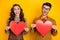 Portrait of nice comic cheerful friends friendship trendy couple holding heart shape having fun isolated on bright