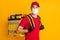 Portrait of nice healthy guy wear gauze mask carrying bag order stop pandemia mers cov concept isolated on bright yellow