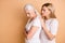 Portrait of nice-looking attractive gloomy grumpy moody bored tired ladies wearing white outfit supporting granny