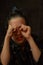 Portrait of nine year old girl. Teenager with blue strands on her hair. A series of photos of a girl of 8 or 9 years old