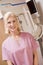Portrait Of A Nurse With Mammogram Machine
