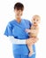 Portrait, nurse and woman with baby in studio isolated on a white background. Face, healthcare and happy medical worker