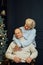 portrait of old couple wife and husband hugging and smiling. Dark blue background. Happy lovers on retirement. Stop