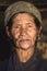 Portrait of a old nepalese woman in national clothes in her house