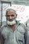 portrait of old pakistani man with white beard