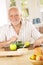 Portrait of older man having morning tea