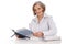 Portrait of an older smiling businesswoman sitting at desk.