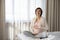 Portrait of overjoyed pregnant woman caress baby bump