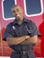 Portrait of paramedic in front of ambulance