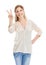 Portrait, peace sign and happy woman at studio for winning isolated on a white background. Smile, fingers and v hand