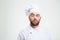 Portrait of a pensive male chef cook looking away