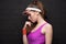 Portrait of pensive sporty woman in fitness clothing