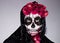 portrait of a person with scary makeup done for day of the dead, dia de los Muertos, traditional holiday in Mexico