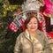 Portrait photo of Beauty Senior asian women with tianmen mountain Tribe traditional shirt at zhangjiajie city China.