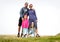 Portrait photo of a family hiking in the mountains,